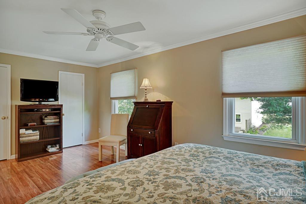 22 Hickory Court Middlesex, NJ 08846 - Photo 16 of 26 a bedroom with a bed and a television