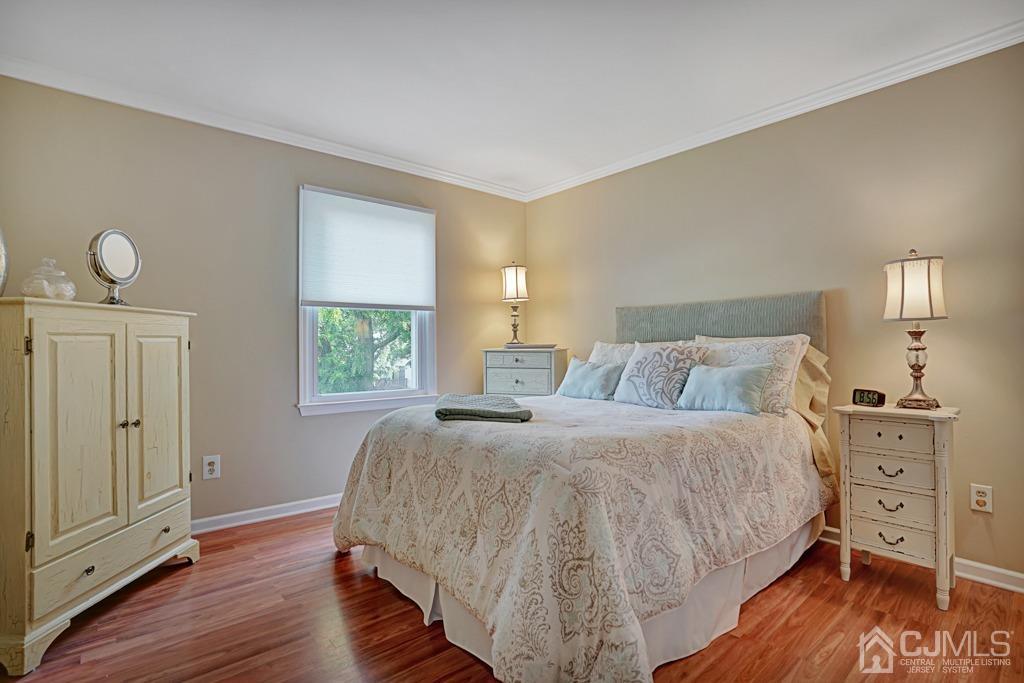 22 Hickory Court Middlesex, NJ 08846 - Photo 18 of 26 a bedroom with a bed and a window