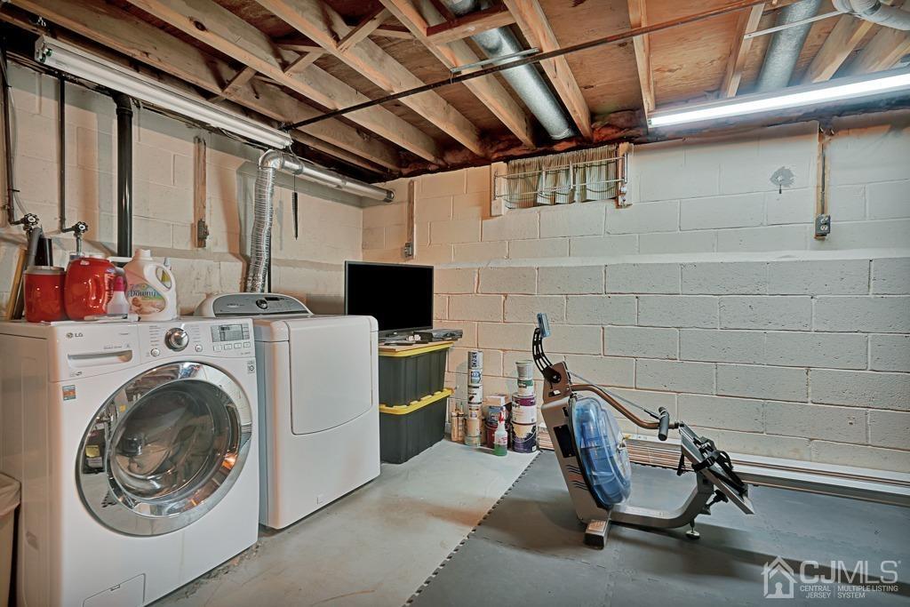 22 Hickory Court Middlesex, NJ 08846 - Photo 24 of 26 a utility room with dryer and washer