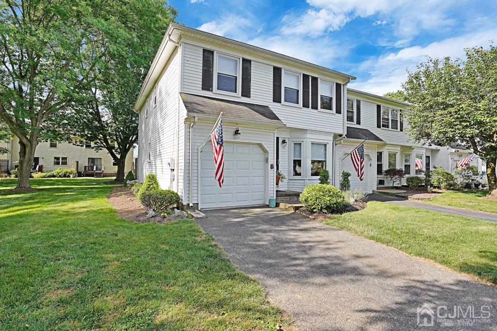 22 Hickory Court Middlesex, NJ 08846 - Photo 26 of 26 a front view of a house with a yard and trees