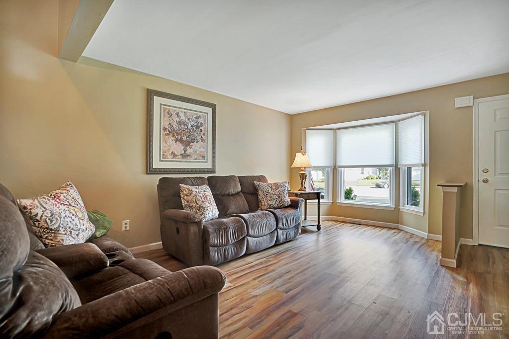 22 Hickory Court Middlesex, NJ 08846 - Photo 4 of 26 a living room with furniture and a window
