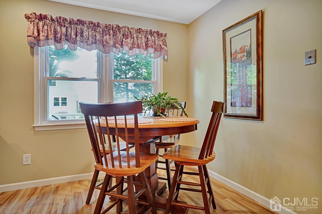 22 Hickory Court Middlesex, NJ 08846 - Photo 10 of 26 a view of a dining room with furniture window and outside view