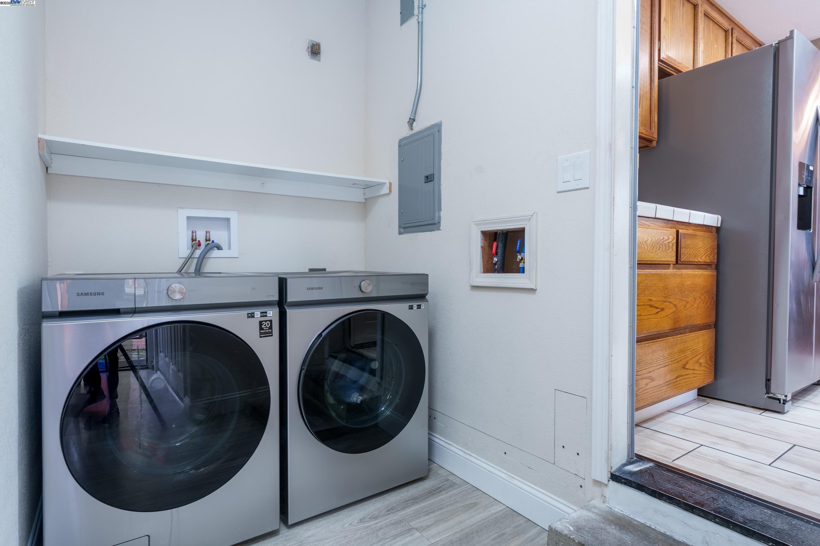 7691 Church Street, Unit B Gilroy, CA 95020 - Photo 15 of 27 a utility room with dryer and washer
