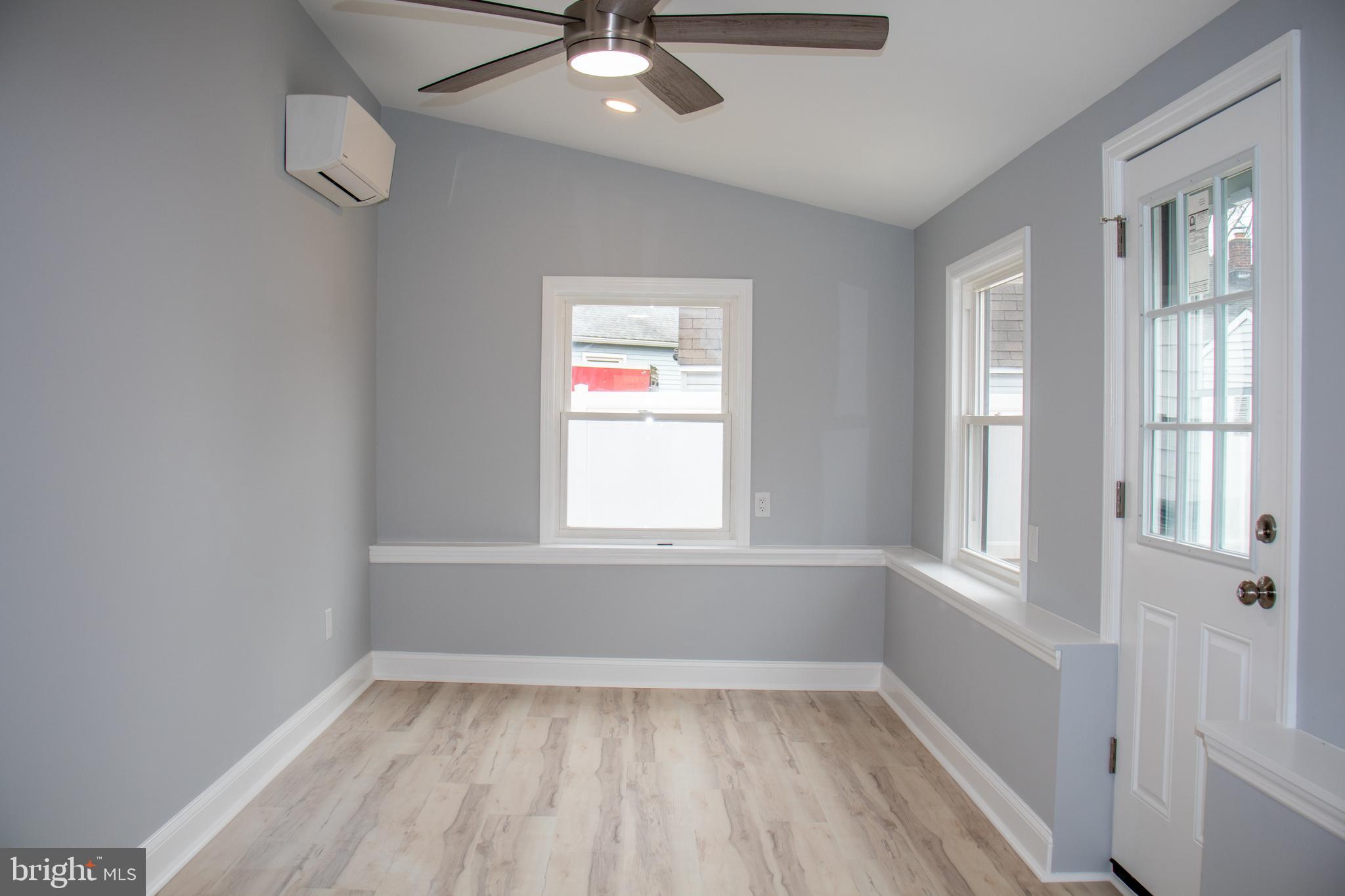 952 Columbus Road Burlington, NJ 08016 - Photo 17 of 36 wooden floor in an empty room with a window