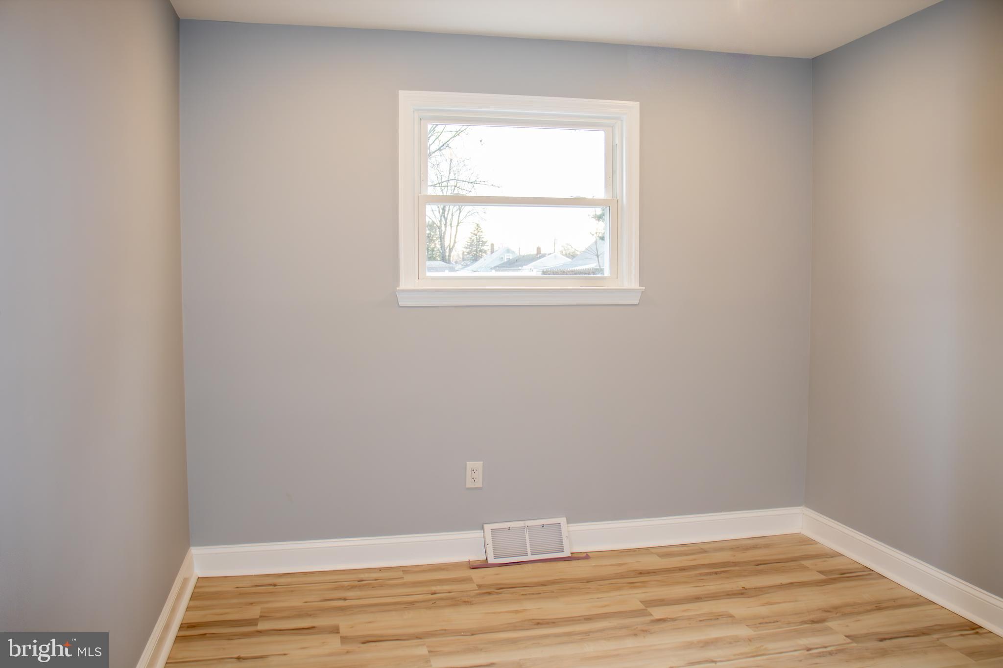952 Columbus Road Burlington, NJ 08016 - Photo 25 of 36 a view of room with window and wooden floor