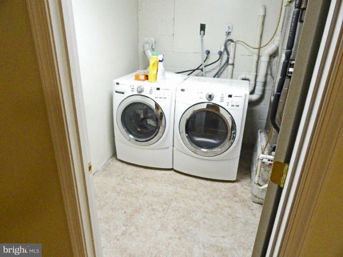 11300 Commanche Road Lusby, MD 20657 - Photo 22 of 24 Separate Laundry Room