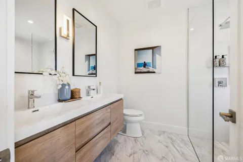 a view of an empty room with an entryway