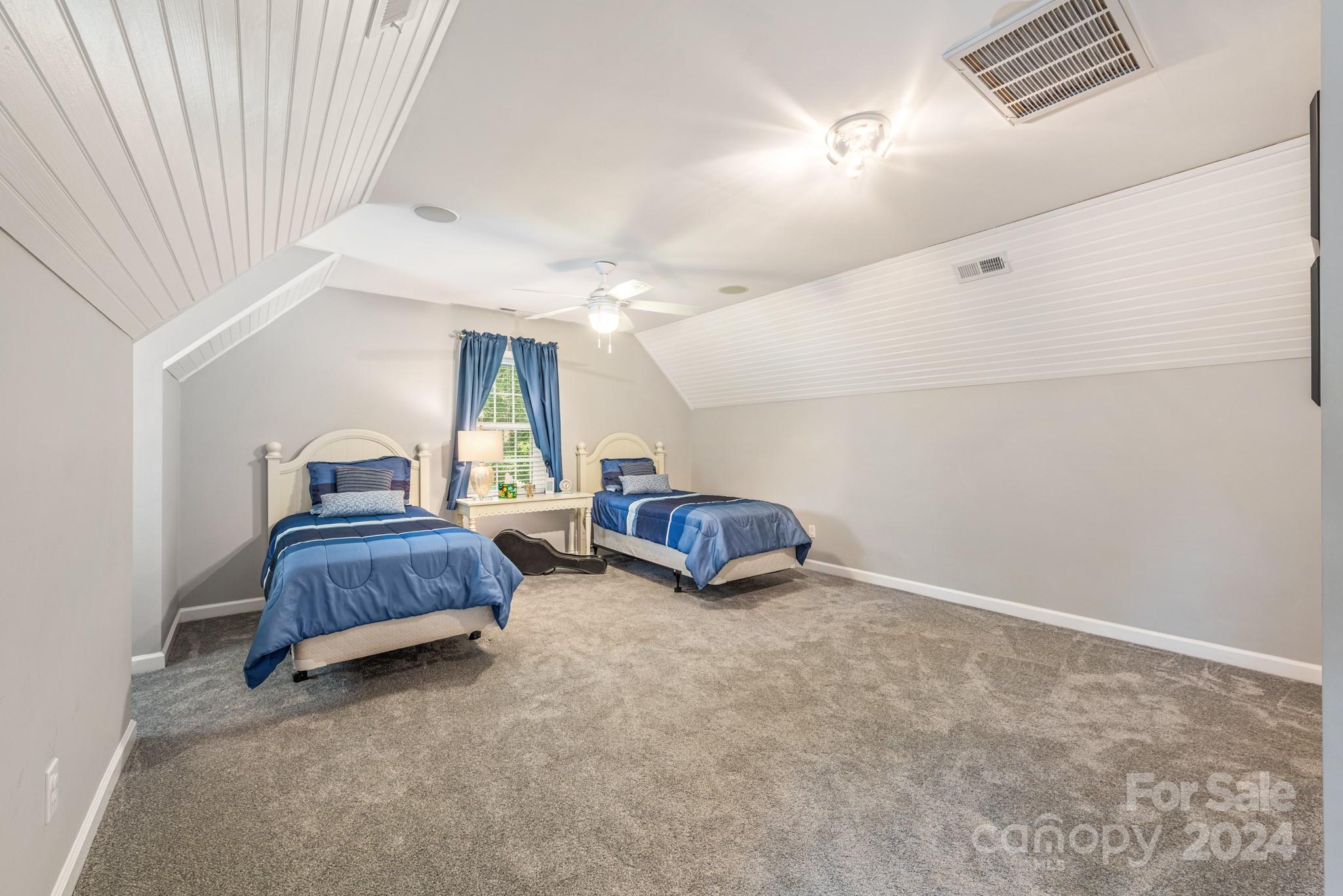 16711 Jetton Road Cornelius, NC 28031 - Photo 17 of 27 a living room with furniture and a window