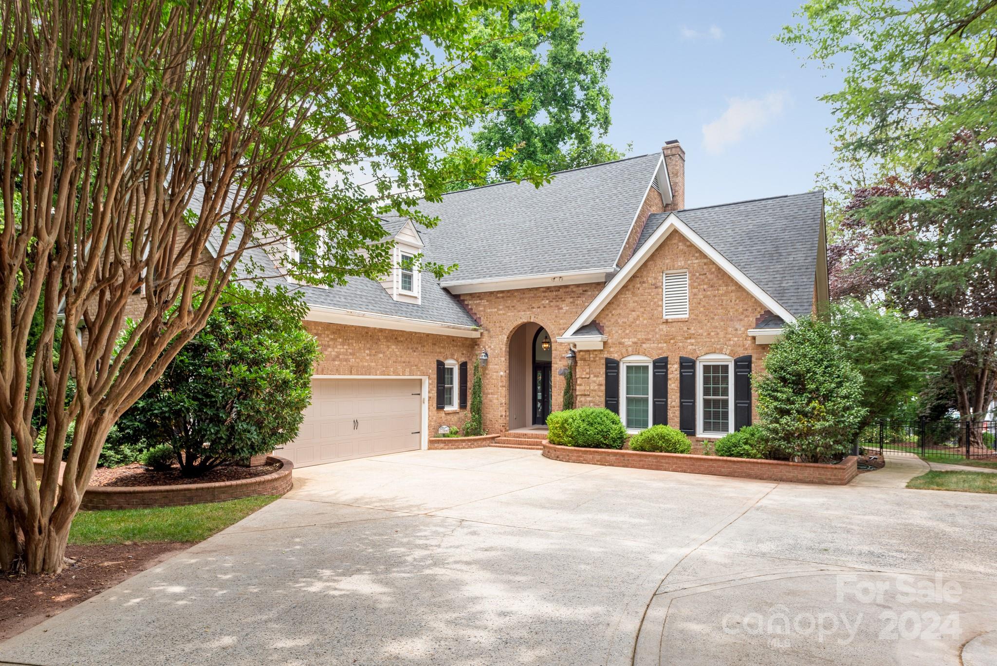 16711 Jetton Road Cornelius, NC 28031 - Photo 27 of 27 a front view of a house with a yard and garage
