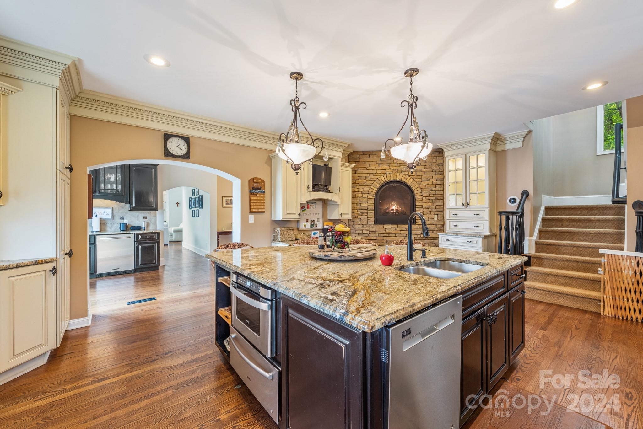 16711 Jetton Road Cornelius, NC 28031 - Photo 9 of 27 a view of living room with granite countertop furniture and fireplace