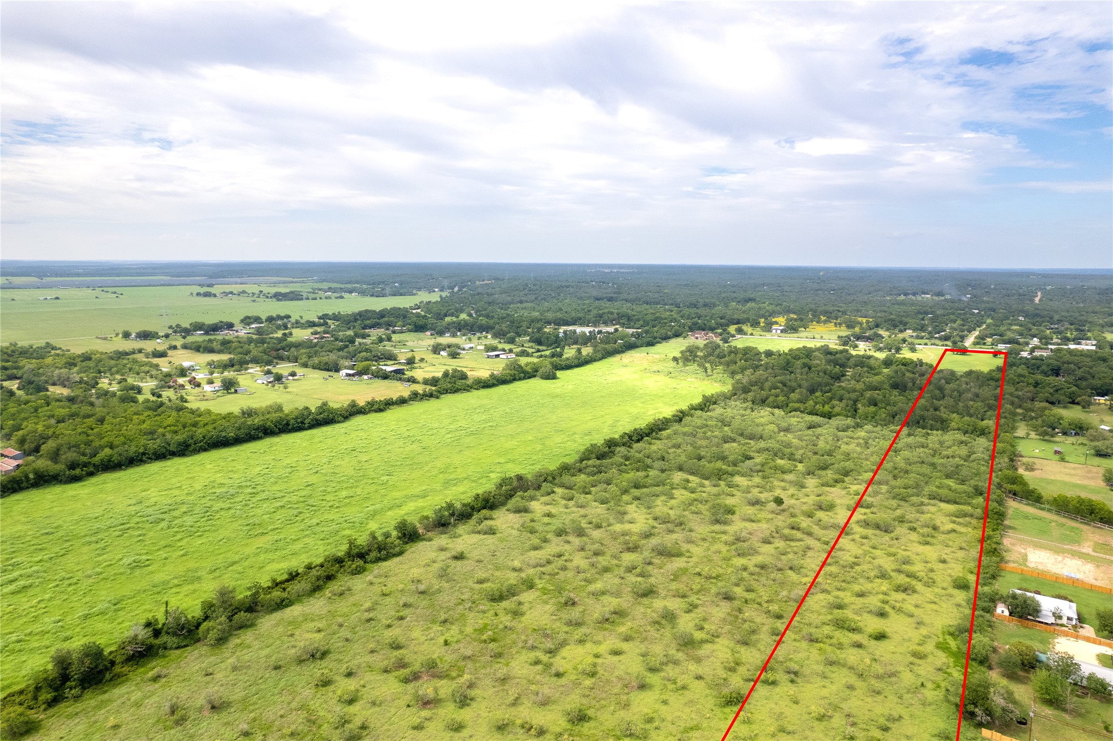 969 Rd Elgin Tx 78602 Road Elgin, TX 78621 - Photo 14 of 17 Aerial view of sparsely populated area with property boundaries highlighted