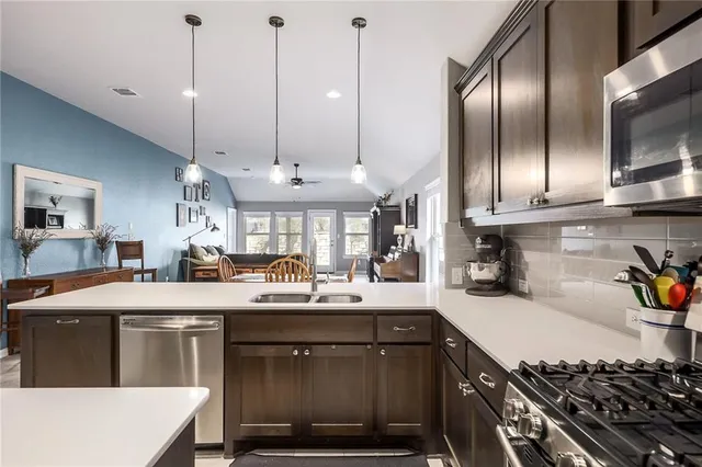 swimming pool with yard and outdoor seating