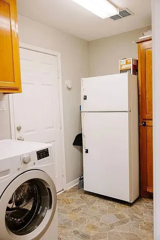 a view of a living room with a wooden floor