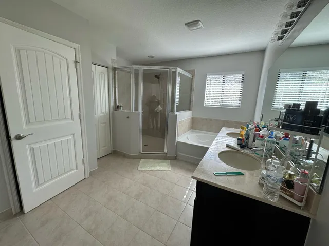 a very nice looking room with kitchen area