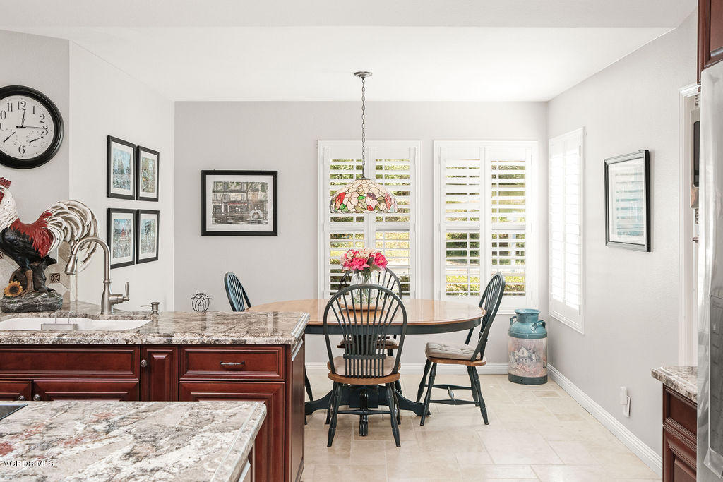 2607 Riata Court Camarillo, CA 93012 - Photo 11 of 54 a view of a dining room with furniture window and wooden floor