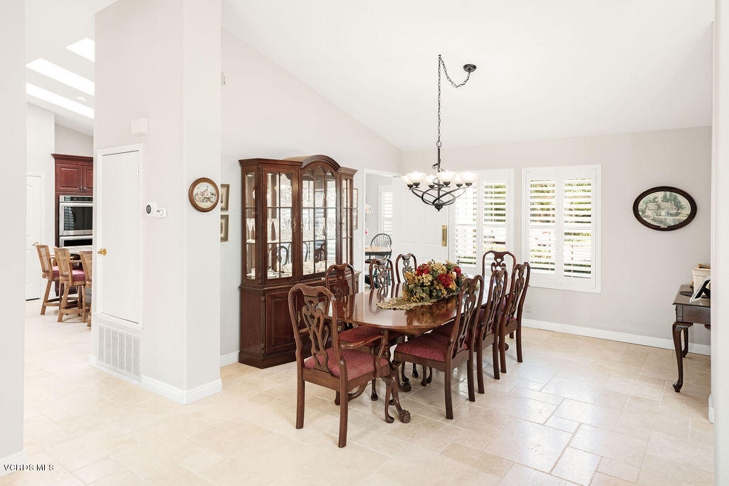 2607 Riata Court Camarillo, CA 93012 - Photo 14 of 54 a view of a dining room and livingroom with furniture wooden floor a chandelier