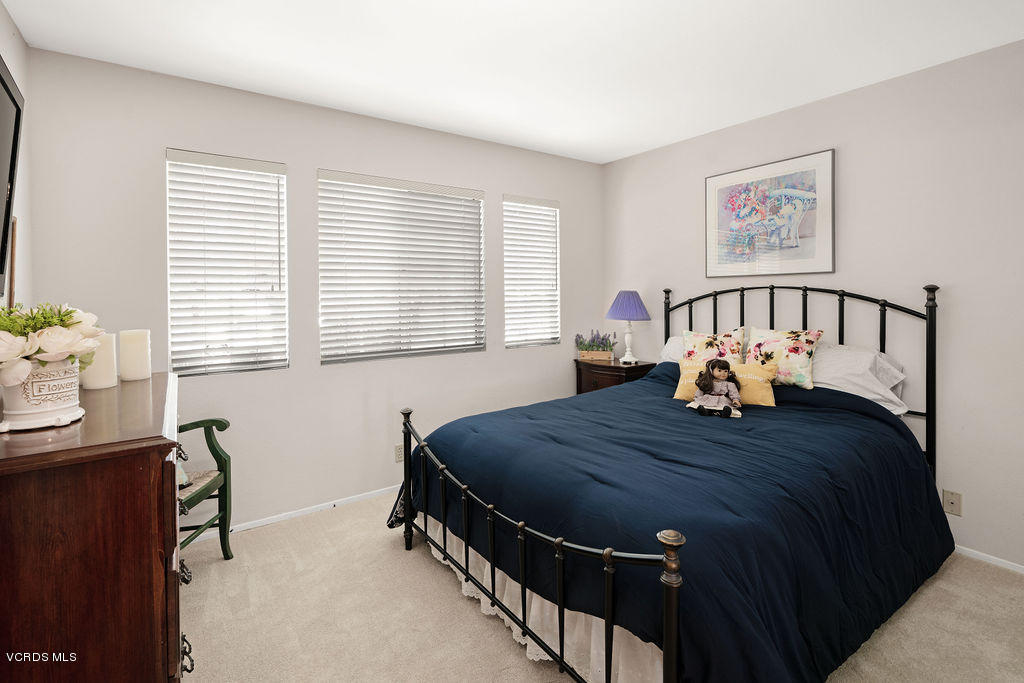 2607 Riata Court Camarillo, CA 93012 - Photo 23 of 54 a bed sitting in a bedroom next to a window