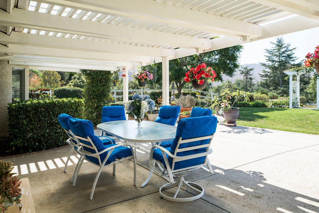 2607 Riata Court Camarillo, CA 93012 - Photo 30 of 54 a view of a dining tables and chairs in the patio