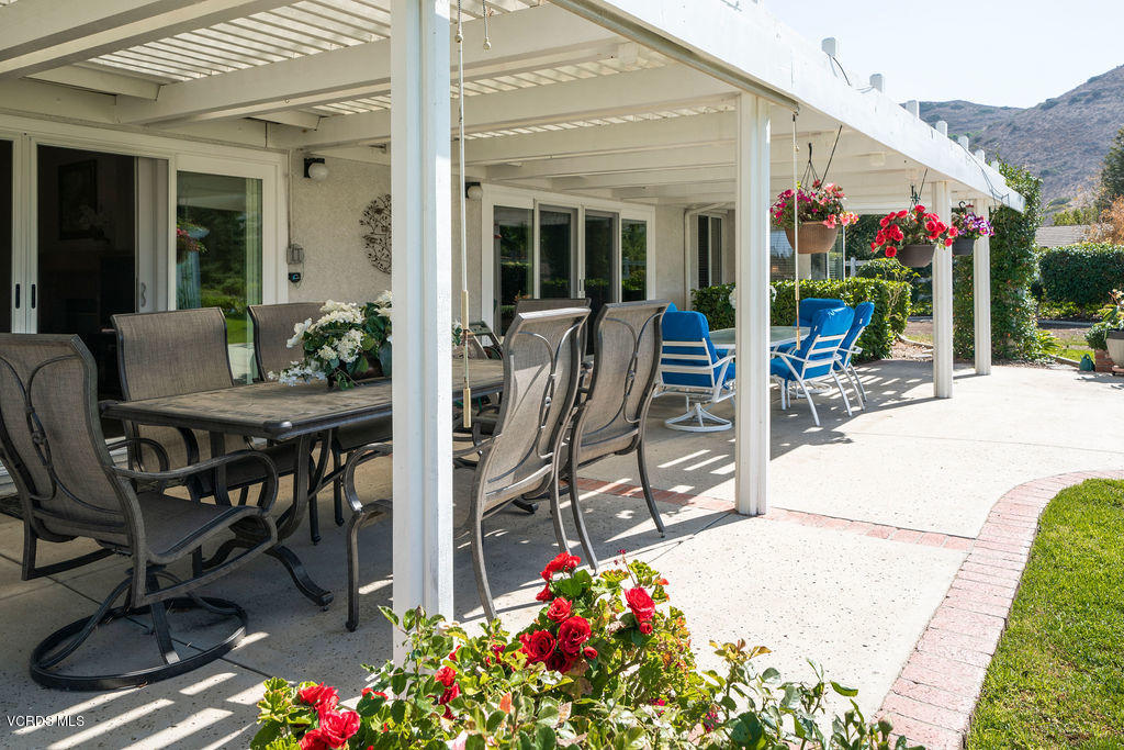 2607 Riata Court Camarillo, CA 93012 - Photo 31 of 54 a view of a patio with a table and chairs