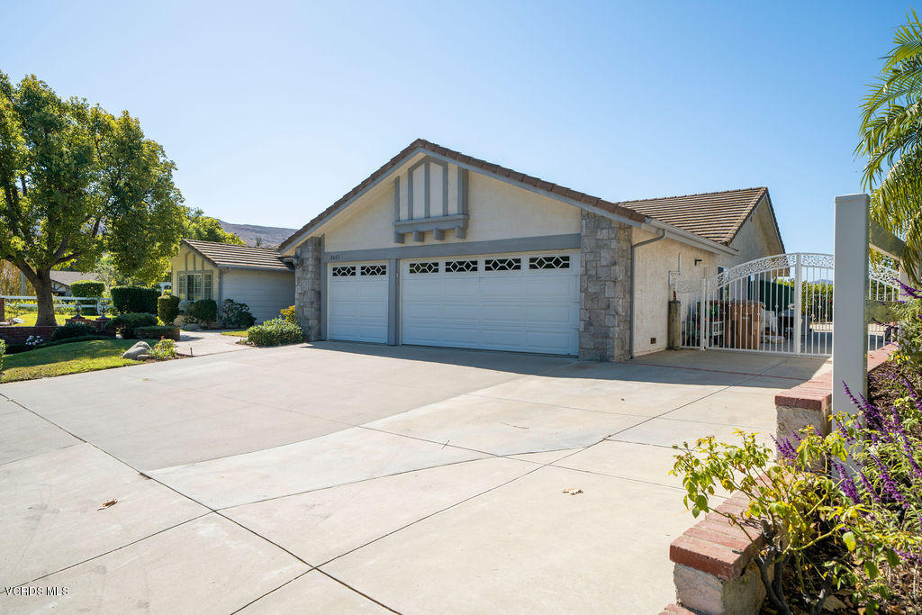 2607 Riata Court Camarillo, CA 93012 - Photo 38 of 54 a front view of a house with a yard