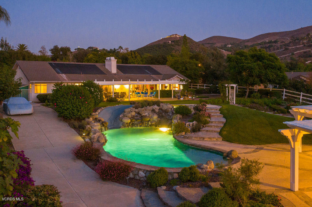 2607 Riata Court Camarillo, CA 93012 - Photo 5 of 54 an aerial view of a house with a garden and lake view