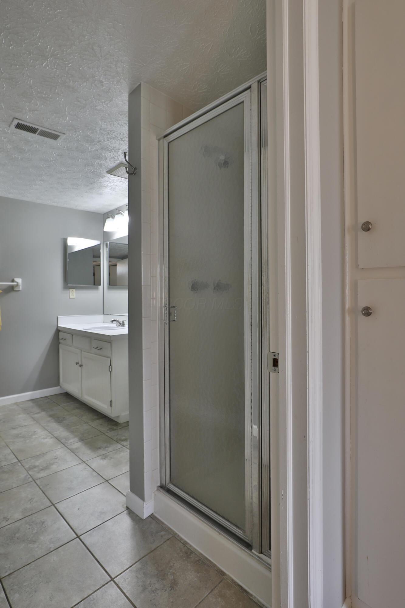 7044 Linworth Road Columbus, OH 43235 - Photo 36 of 48 Full lower level bathroom