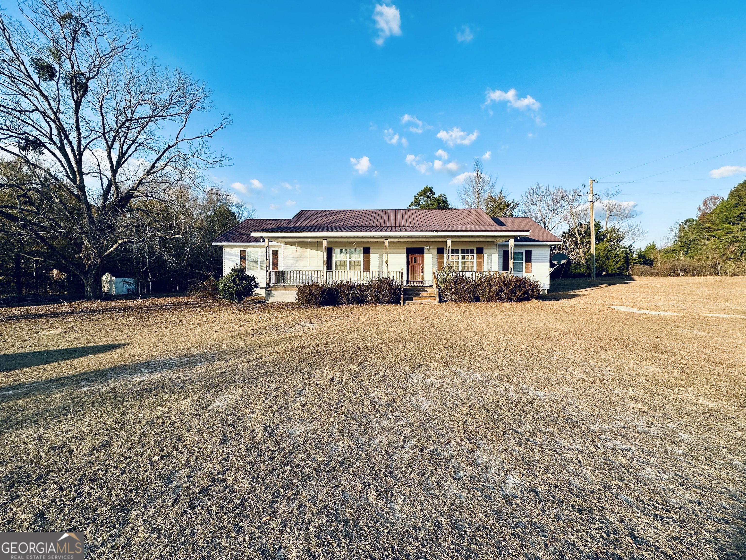 74 Community Church Road McRae-Helena, GA 31037 - Photo 1 of 31 a view of a house with a yard