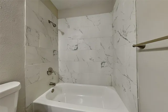 a bathroom with a bathtub