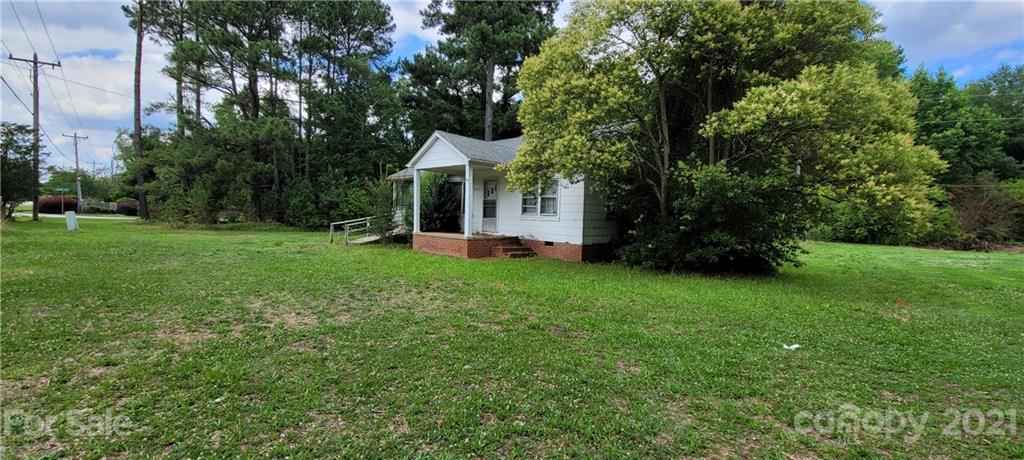 2615 Anderson Road South Catawba, SC 29704 - Photo 2 of 12 a front view of a house with garden