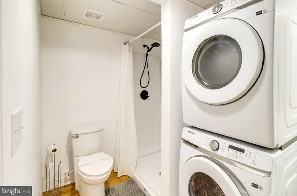 a bathroom with a toilet and a sink