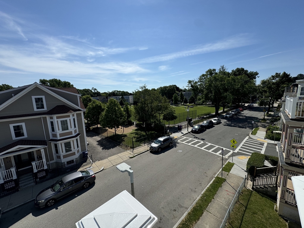 11 Wainwright Street, Unit 3 Boston, MA 02124 - Photo 21 of 26 a view of multiple houses with city street