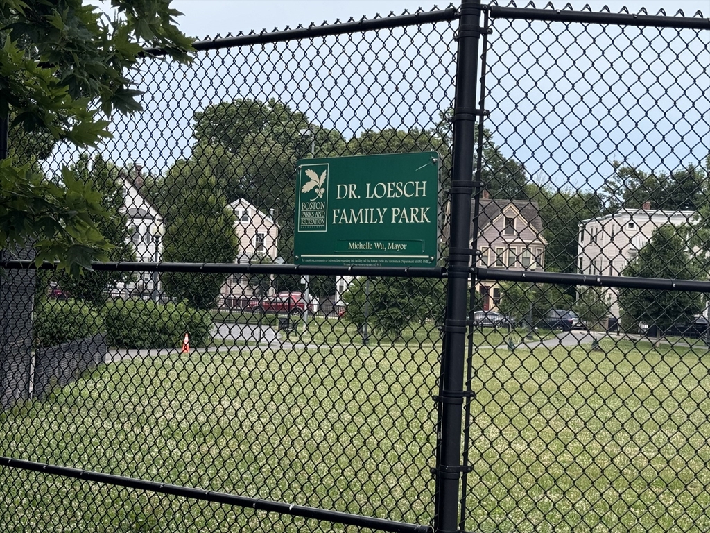 11 Wainwright Street, Unit 3 Boston, MA 02124 - Photo 22 of 26 a sign on the side of a building