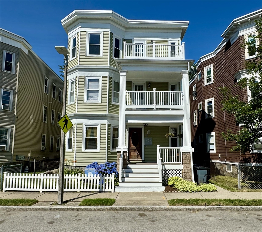 11 Wainwright Street, Unit 3 Boston, MA 02124 - Photo 26 of 26 a front view of a house with a garden