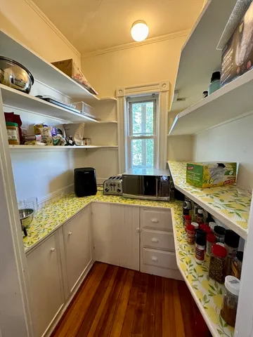 a kitchen with stainless steel appliances granite countertop a sink and wooden cabinets