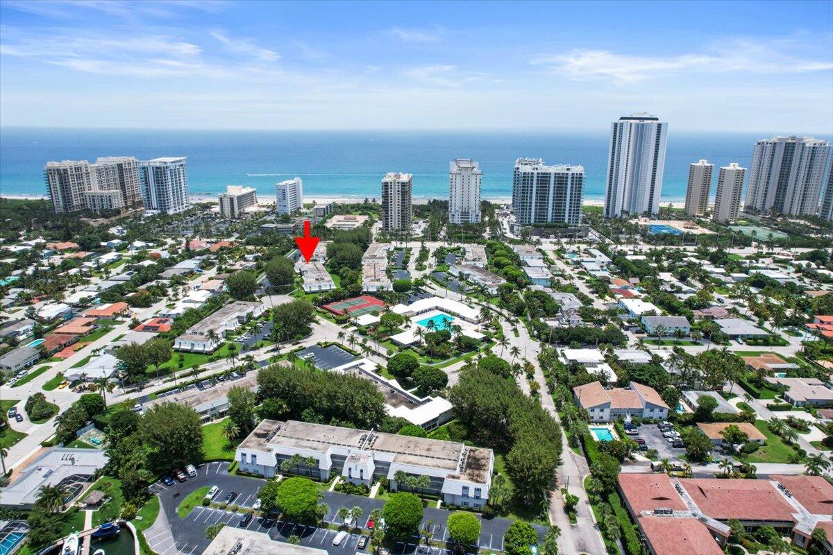 1252 Sugar Sands Boulevard, Unit 132 Riviera Beach, FL 33404 - Photo 39 of 40 a view of a city with tall buildings