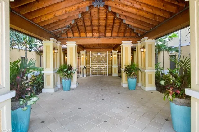 a view of a porch with a potted plant
