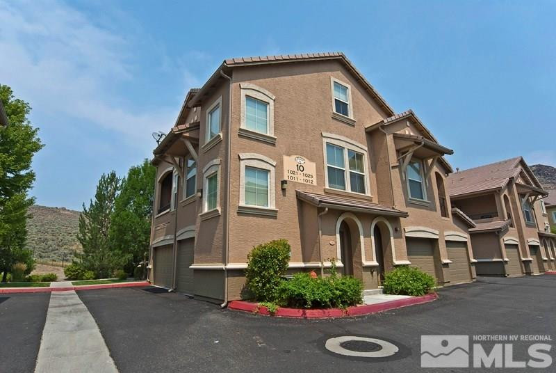 9050 Double R Boulevard, Unit 1023 Reno, NV 89521 - Photo 1 of 1 a front view of a house with plants and trees