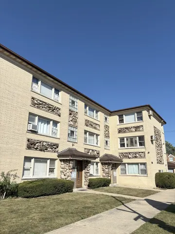 a front view of a building with street view