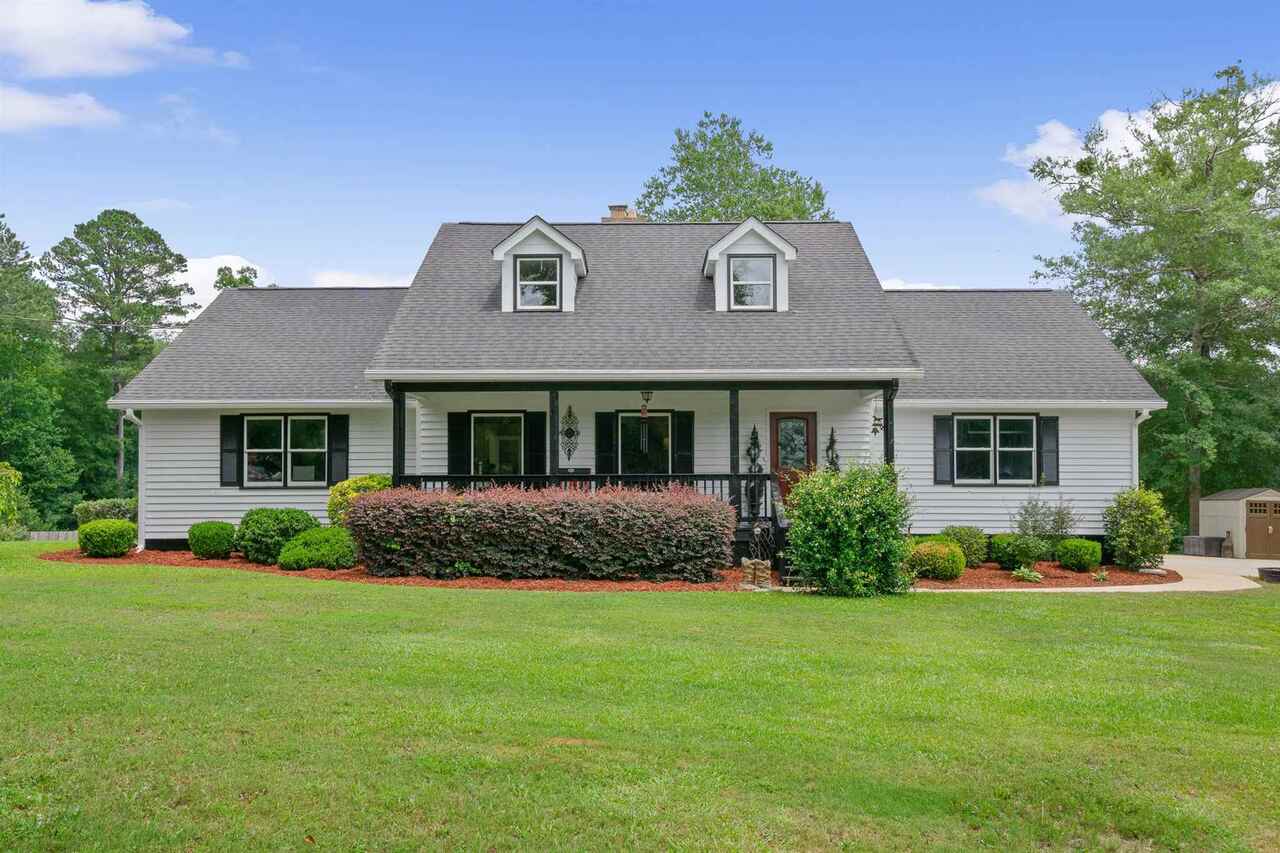 1094 Fincherville Road Jackson, GA 30233 - Photo 1 of 1 a front view of house with yard and green space