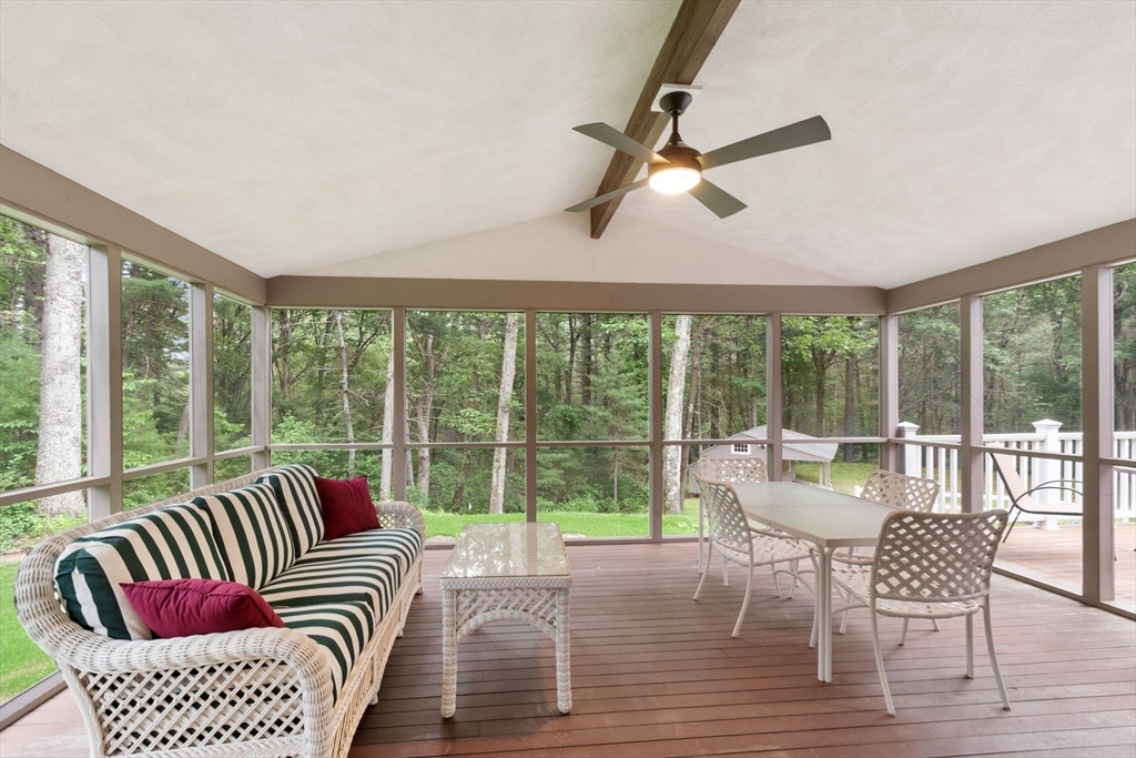 244 Hunters Ridge Road Concord, MA 01742 - Photo 38 of 41 a living room with furniture and a large window