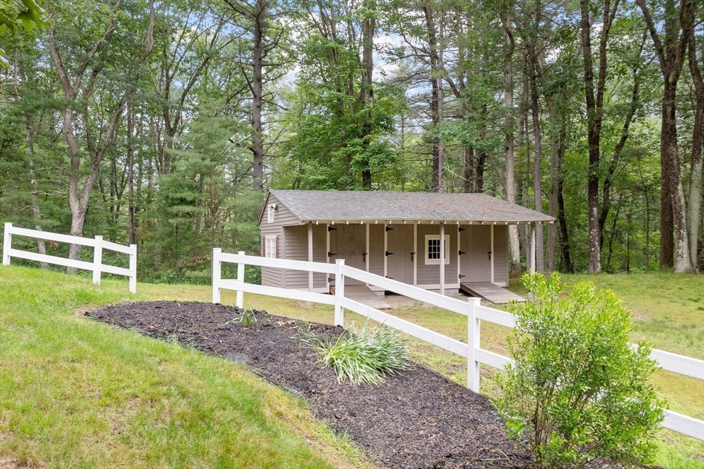 244 Hunters Ridge Road Concord, MA 01742 - Photo 4 of 41 front view of a house with a yard