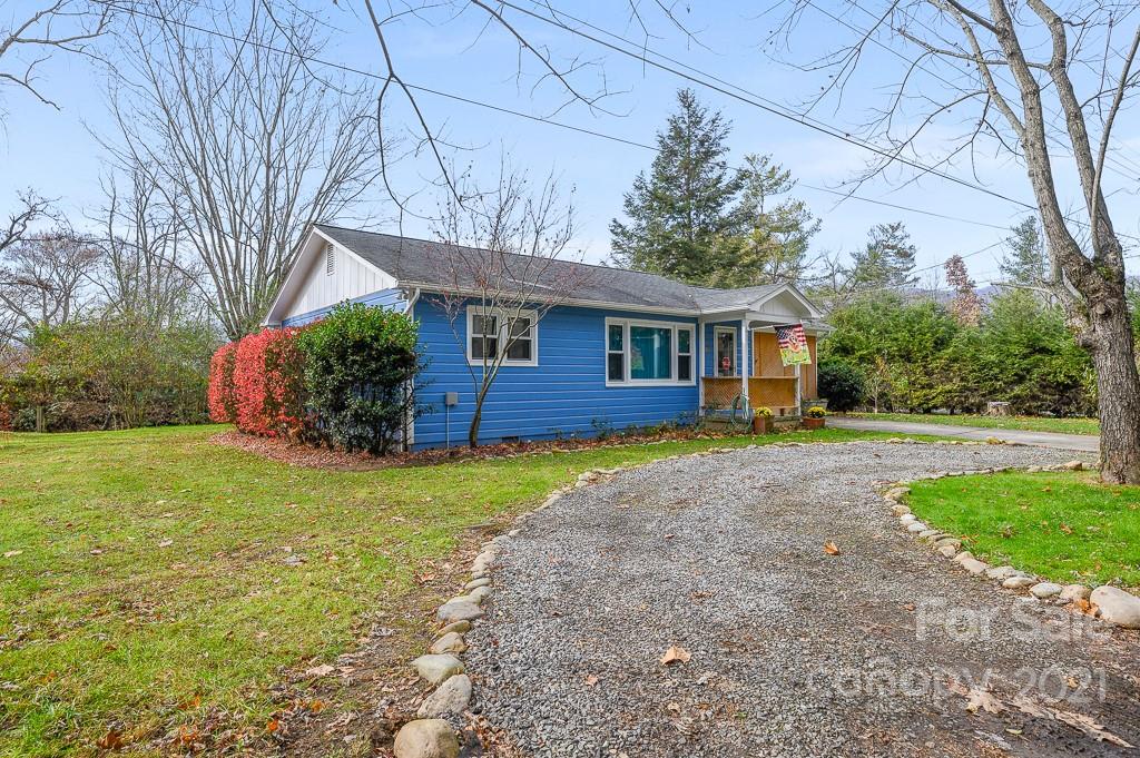 14 Browning Road Waynesville, NC 28786 - Photo 1 of 26 a front view of house with yard and green space
