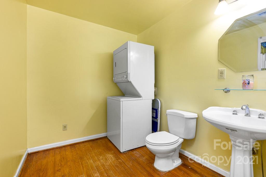 14 Browning Road Waynesville, NC 28786 - Photo 18 of 26 a bathroom with a toilet and a sink