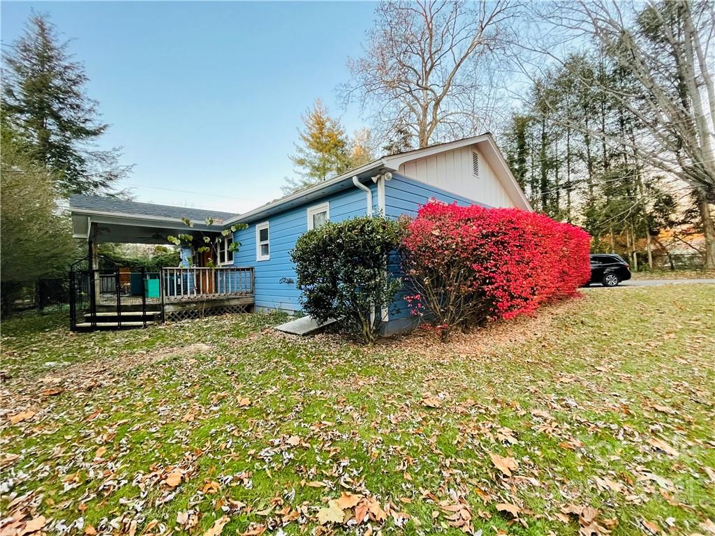 14 Browning Road Waynesville, NC 28786 - Photo 2 of 26 a view of a house with a yard covered in snow