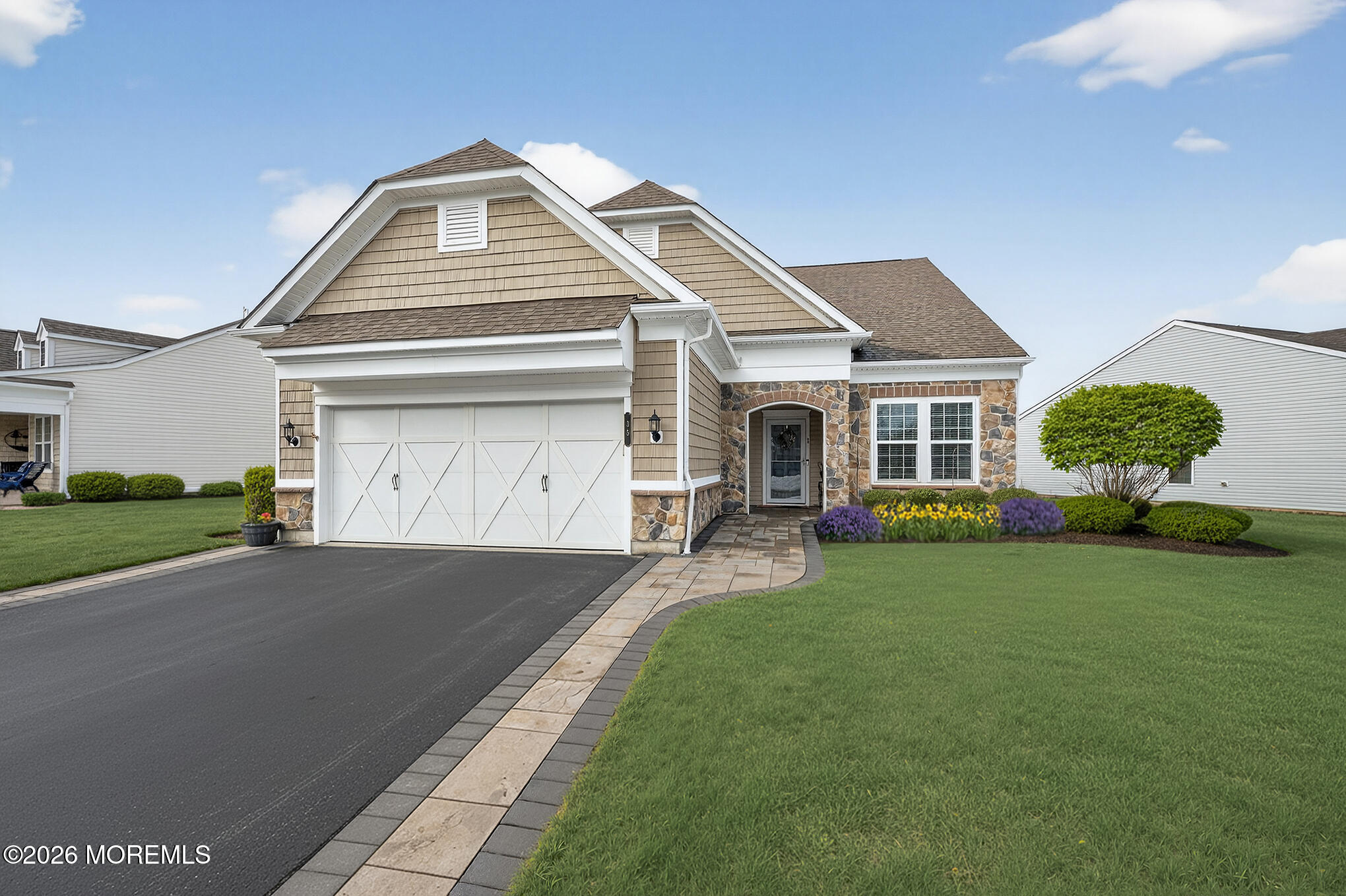 35 Addlestone Lane Manchester Township, NJ 08759 - Photo 1 of 44 a front view of a house with a yard and garage