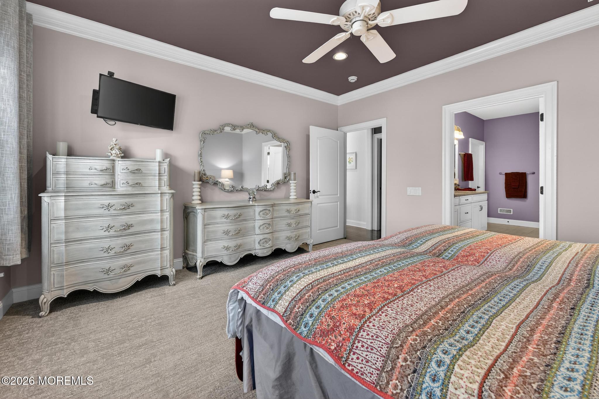 35 Addlestone Lane Manchester Township, NJ 08759 - Photo 21 of 44 a bedroom with a bed and a flat tv screen