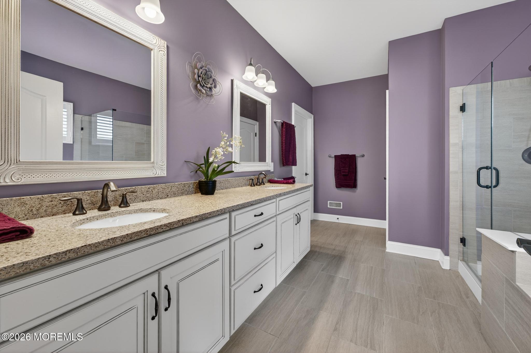 35 Addlestone Lane Manchester Township, NJ 08759 - Photo 22 of 44 a spacious bathroom with a granite countertop sink mirror and double