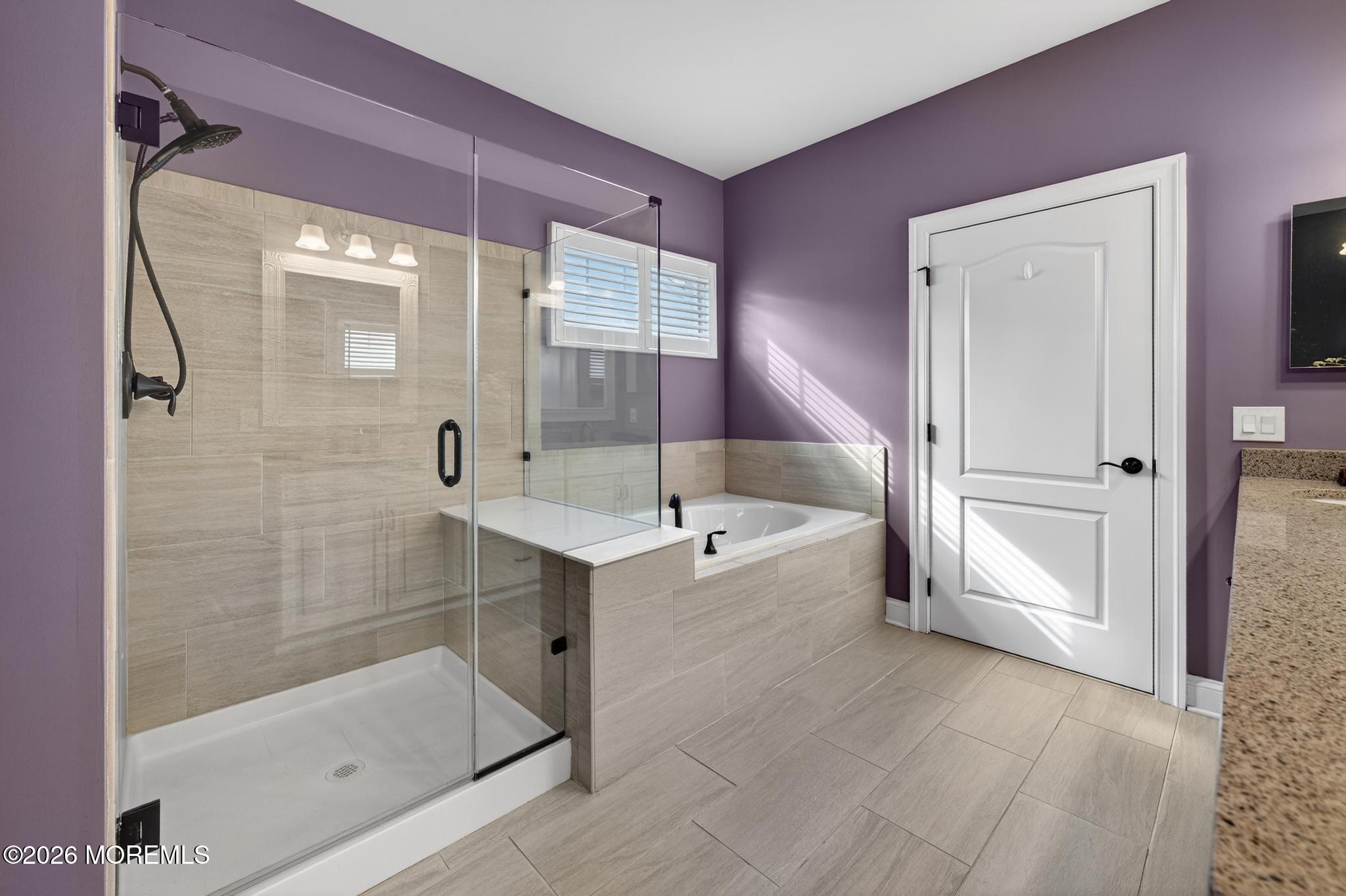 35 Addlestone Lane Manchester Township, NJ 08759 - Photo 23 of 44 a bathroom with a bathtub and a shower