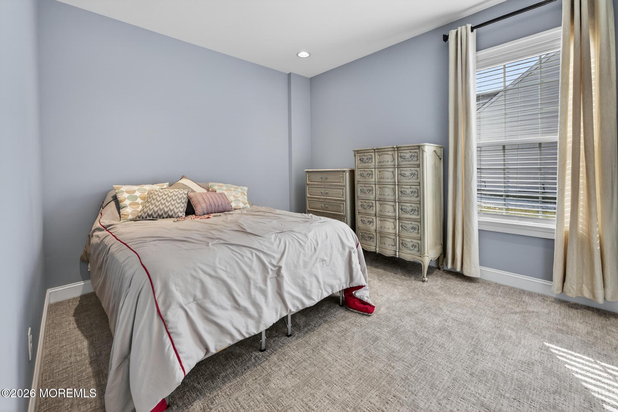 35 Addlestone Lane Manchester Township, NJ 08759 - Photo 28 of 44 a bedroom with a bed and a cabinets