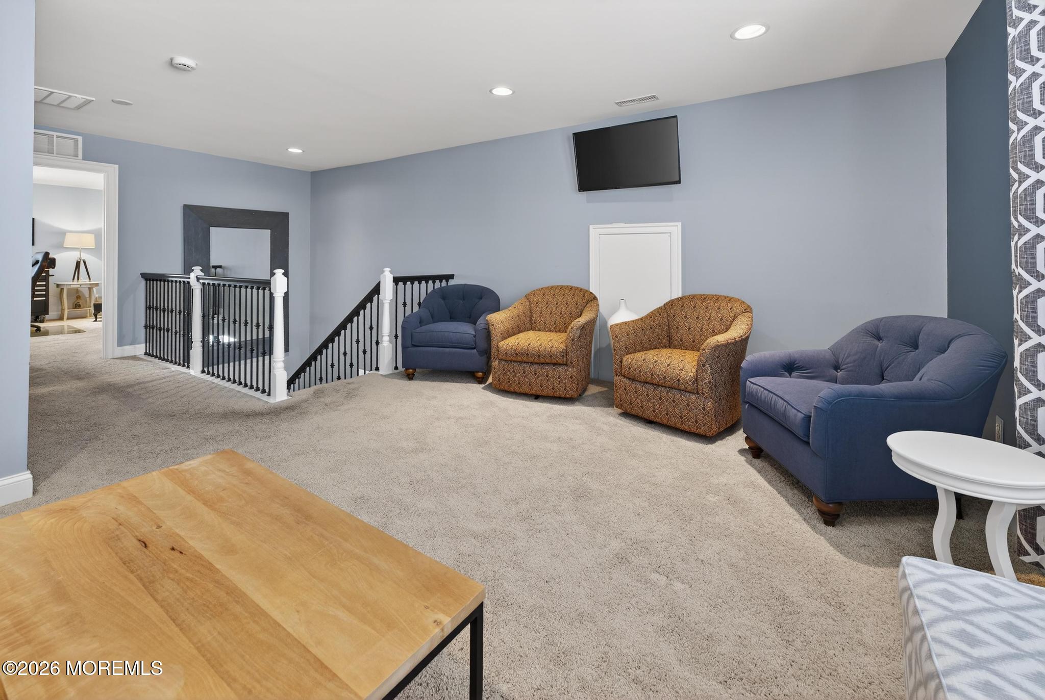 35 Addlestone Lane Manchester Township, NJ 08759 - Photo 32 of 44 a living room with furniture and a flat screen tv